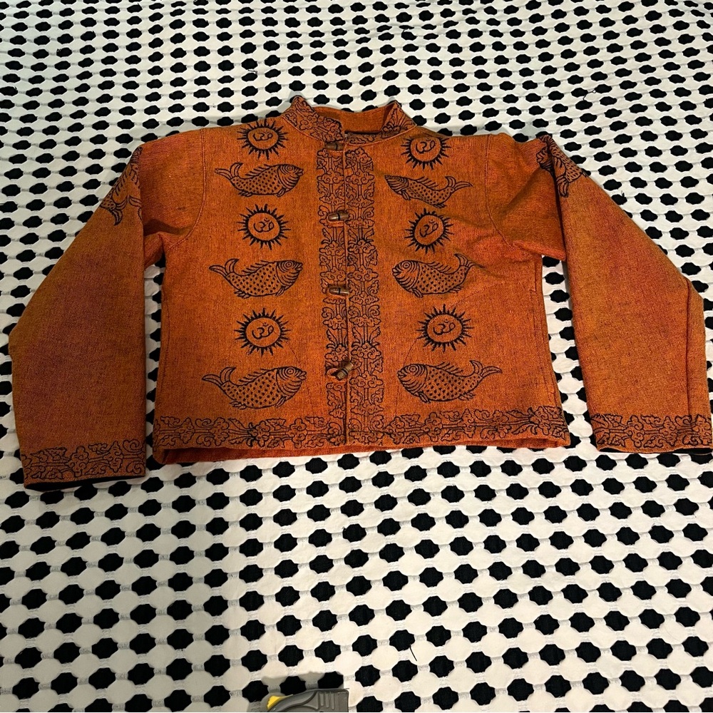 Ganesh Himal Fish Orange Jacket